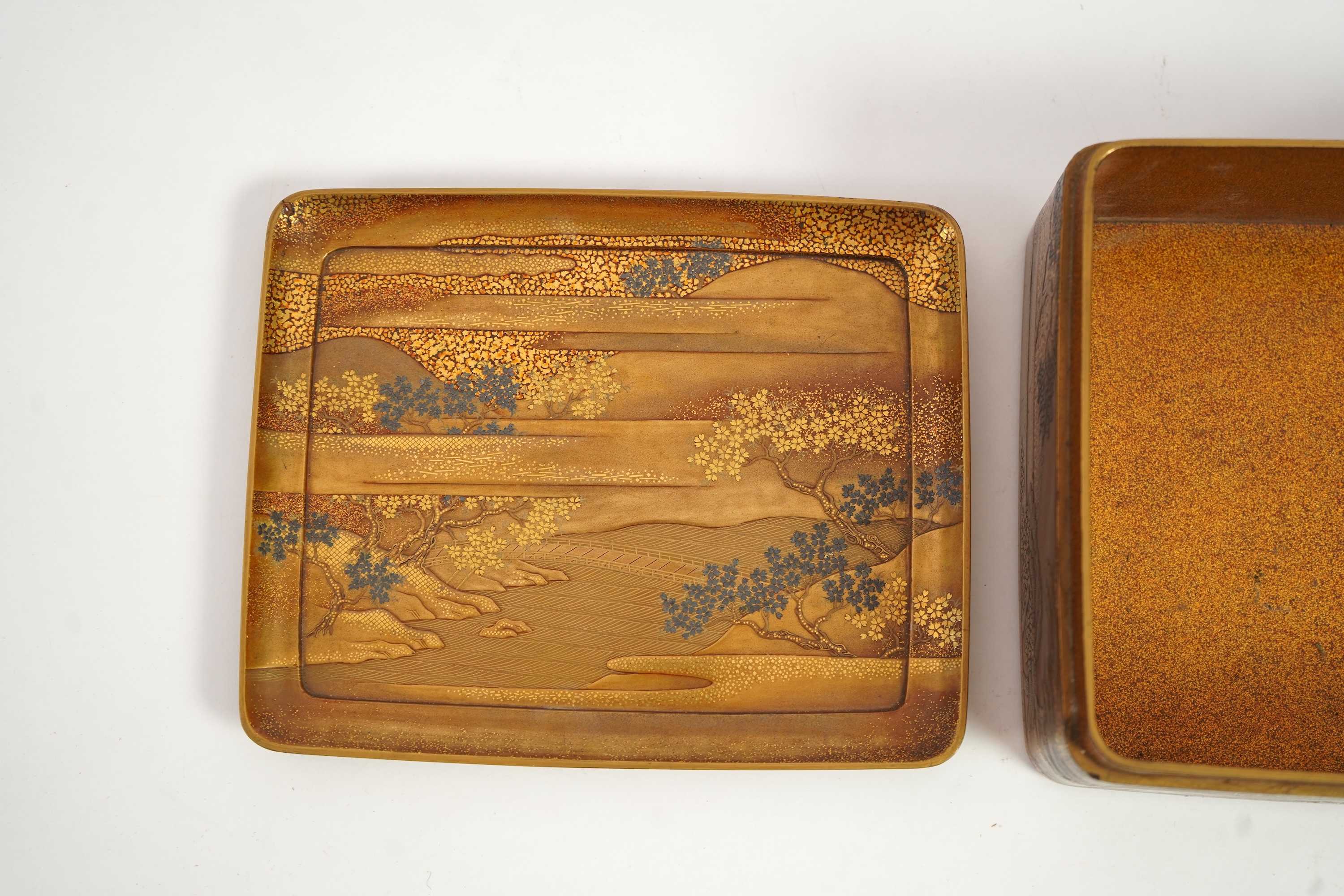 A Japanese gold lacquer ‘landscape’ box, tray and cover, 19th century